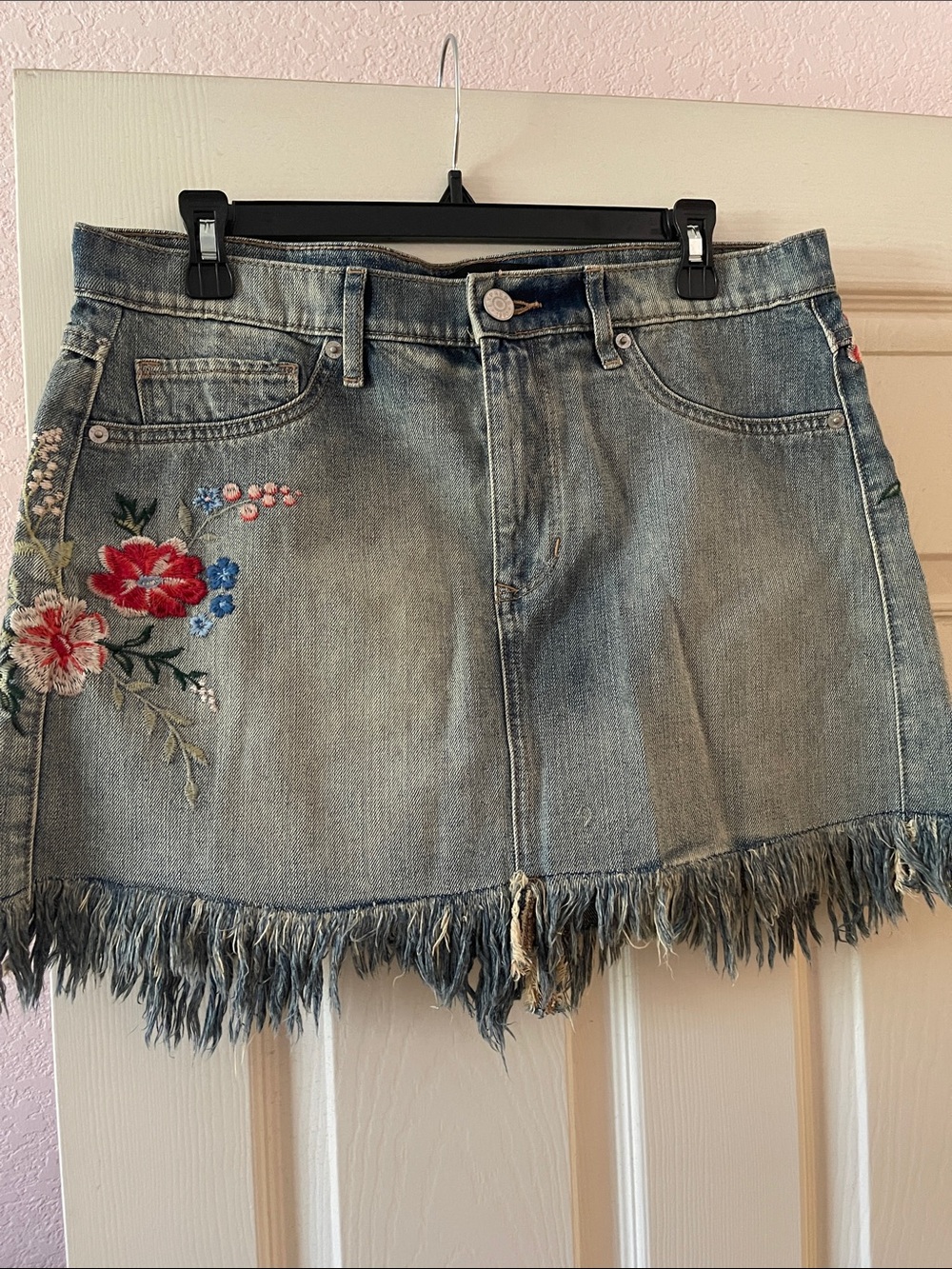 Express Light Blue Denim Mini Skirt with Floral Embroidery and Fringe